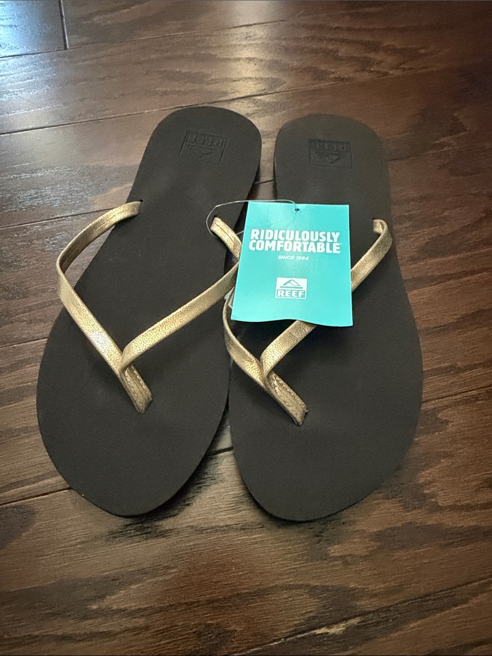 Reef Flip Flops in Brown with Gold Straps